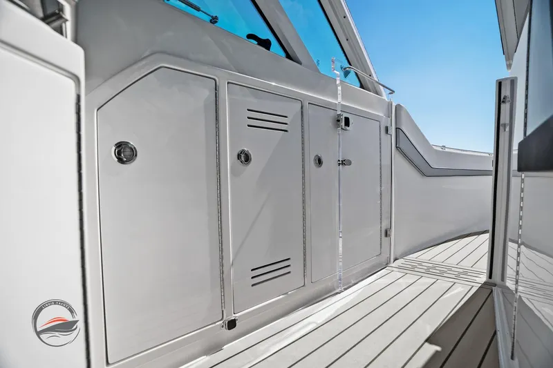 Slide: The Image of 2025 Formula 380 Super Sport Crossover OB boat interior with sleek cabinetry and modern design. - 39