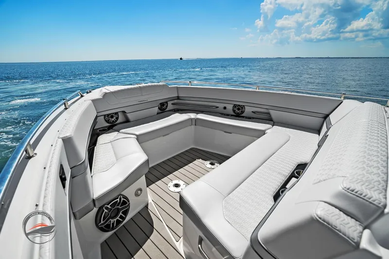 Slide: The Image of Luxurious seating on 2025 Formula 380 Super Sport Crossover OB boat, ocean view. - 41