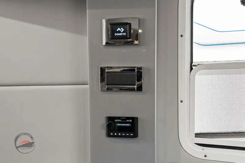 Slide: The Image of Control panel inside 2025 Formula 380 Super Sport Crossover OB boat, featuring modern technology. - 48