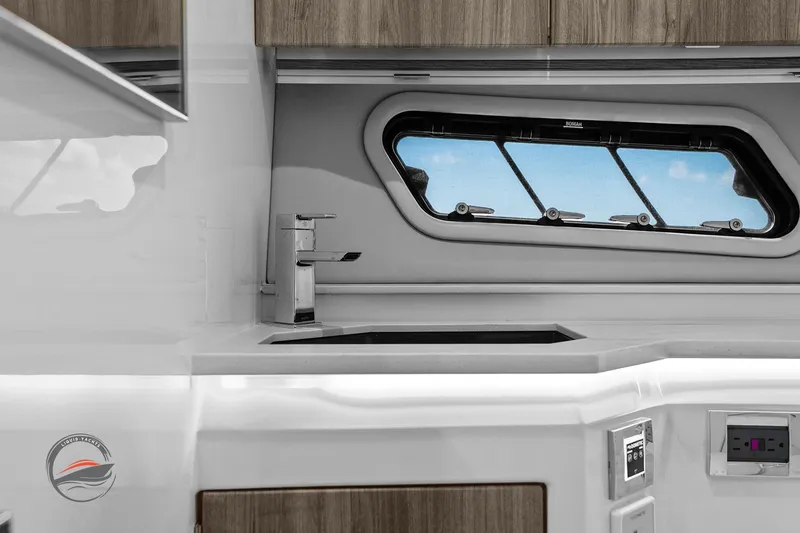 Slide: The Image of Interior of 2025 Formula 380 Super Sport Crossover OB yacht, featuring sleek kitchen design. - 51