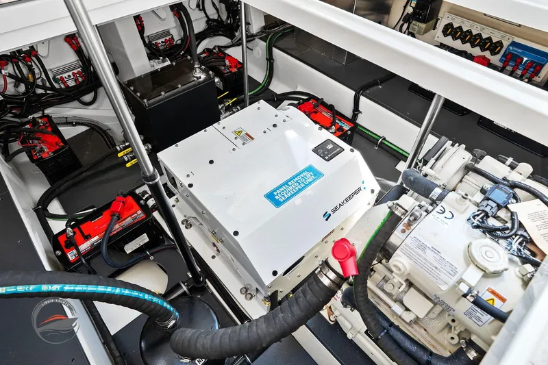 Slide: The Image of Engine compartment of 2025 Formula 380 Super Sport Crossover OB with Seakeeper system. - 55