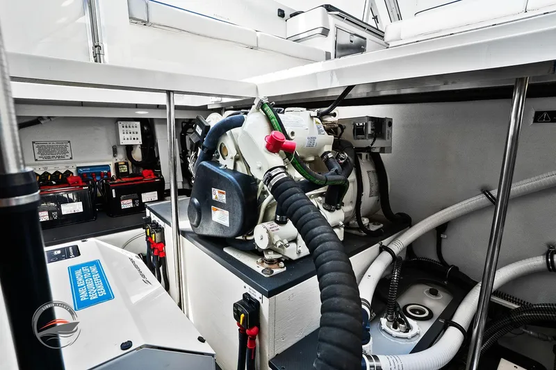 Slide: The Image of Engine compartment of 2025 Formula 380 Super Sport Crossover OB, showcasing mechanical components. - 56