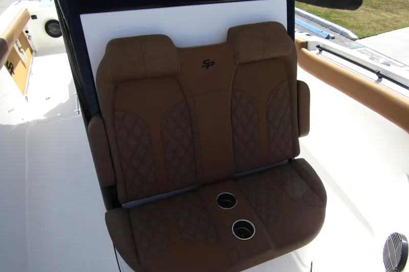 Slide: The Image of Brown leather seats on 2025 Sea Pro 322 Offshore boat, featuring cup holders. - 14