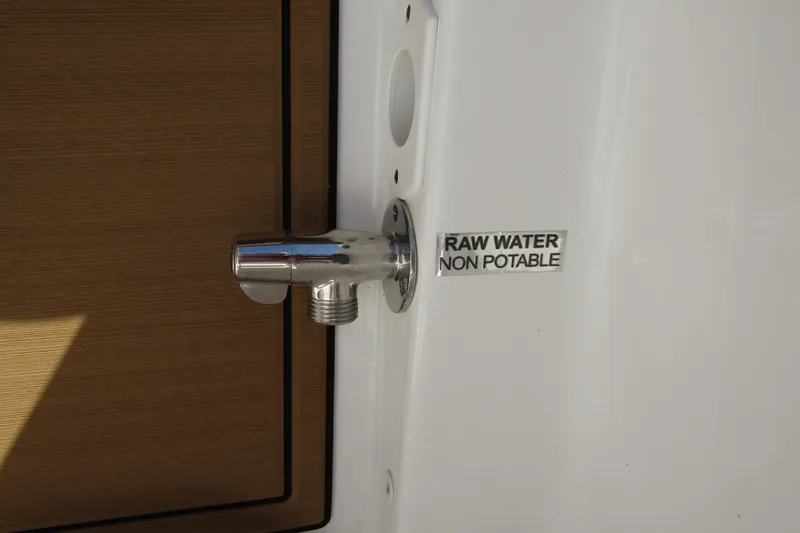 Slide: The Image of Raw water outlet on 2025 Sea Pro 322 Offshore, labeled "Non Potable." - 34