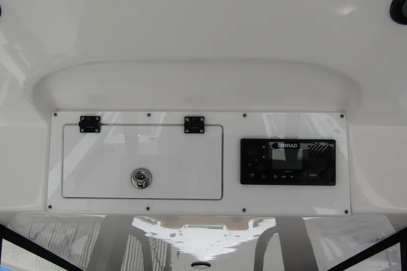 Slide: The Image of Control panel of 2025 Sea Pro 322 Offshore boat with Simrad display. - 30