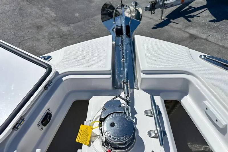 Slide: The Image of Bow view of 2025 Edgewater 262CX Crossover boat with anchor and winch system. - 40
