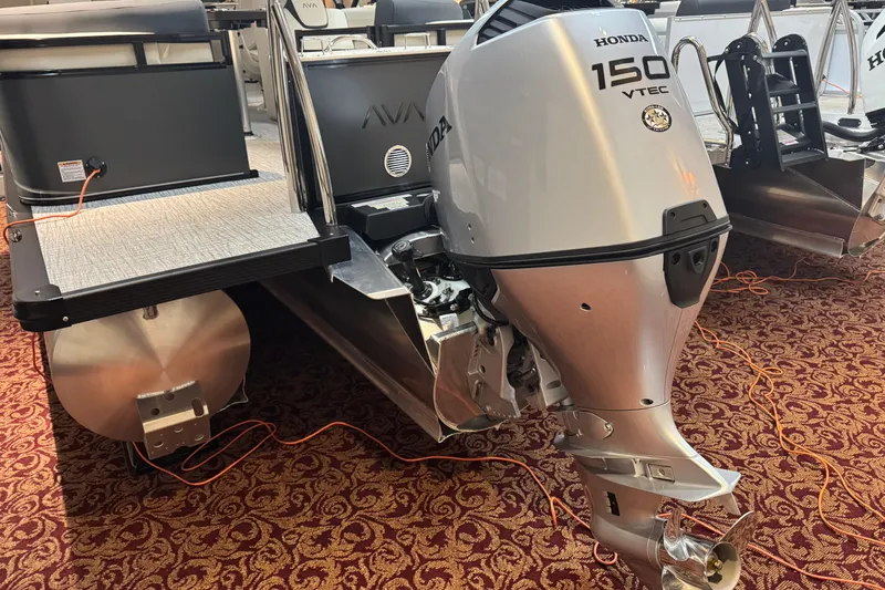 Slide: The Image of 2026 Avalon LSL QL boat with Honda 150 VTEC outboard motor on display. - 13