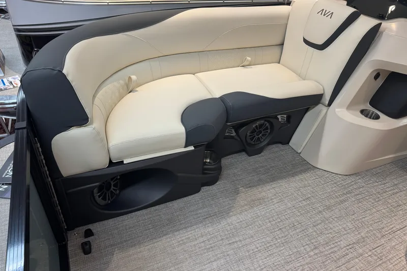 Slide: The Image of Luxurious seating in 2026 Avalon LSL QL boat with integrated speakers and cup holder. - 7