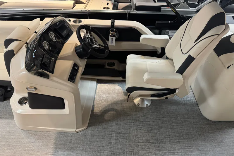 Slide: The Image of Luxurious Avalon LSL QL 2026 boat interior with sleek captain's chair and modern dashboard. - 9