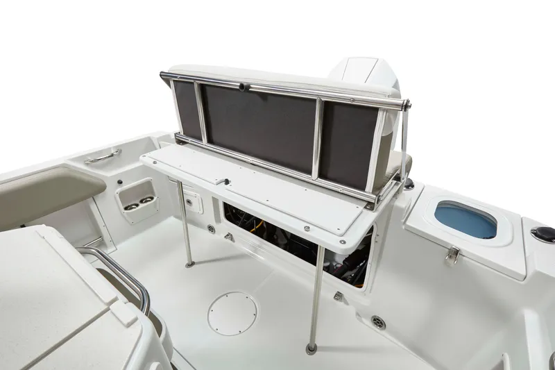Slide: The Image of 2026 Finseeker 220 CC boat interior with seating and storage features. - 8