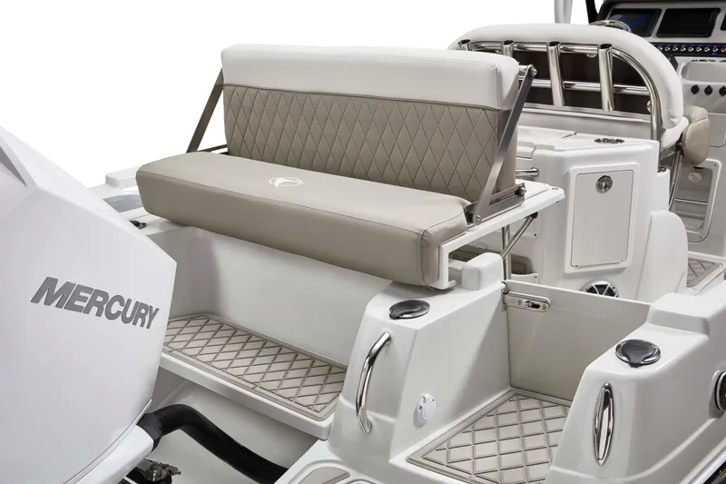 Slide: The Image of 2026 Finseeker 220 CC boat interior with Mercury engine, featuring cushioned seating and modern design. - 9