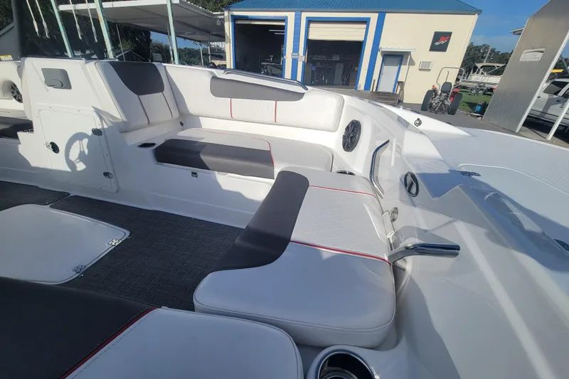 Slide: The Image of Interior of a 2023 Tahoe 1950 boat with spacious seating and modern design. - 10