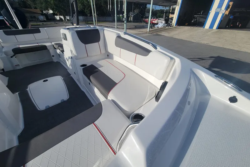 Slide: The Image of Interior of a 2023 Tahoe 1950 boat with spacious seating and modern design. - 7