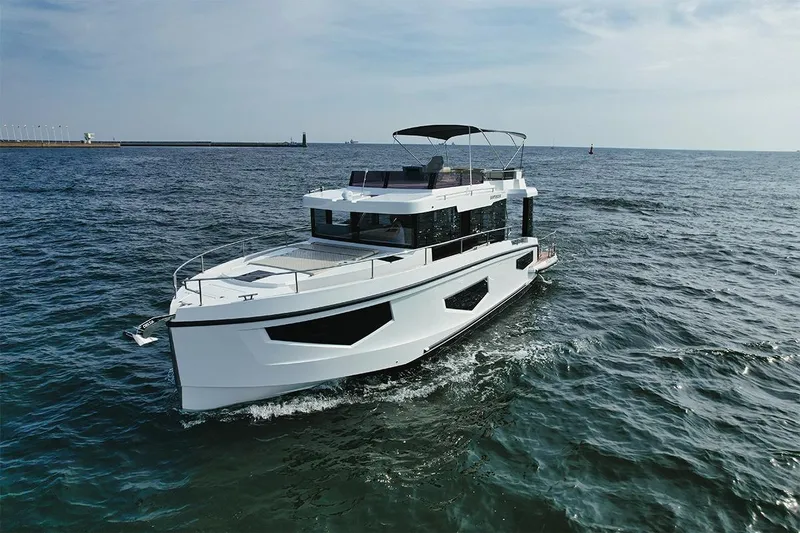 Slide: The Image of 2025 Cobra Sea Master yacht cruising on open water. - 3