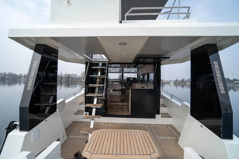 Slide: The Image of Modern Cobra Sea Master 2025 yacht with sleek design and spacious deck area. - 4