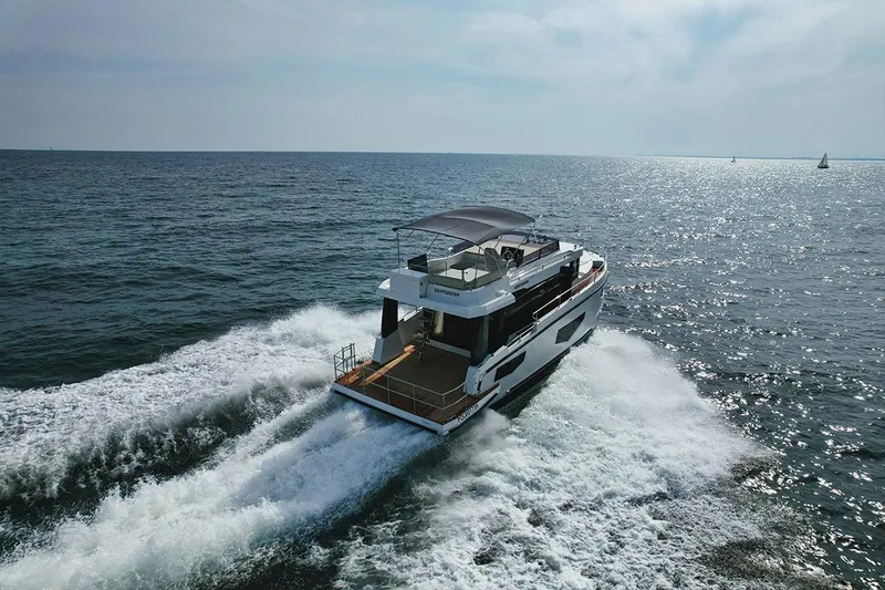 Slide: The Image of 2025 Cobra Sea Master yacht cruising on open ocean waters. - 6