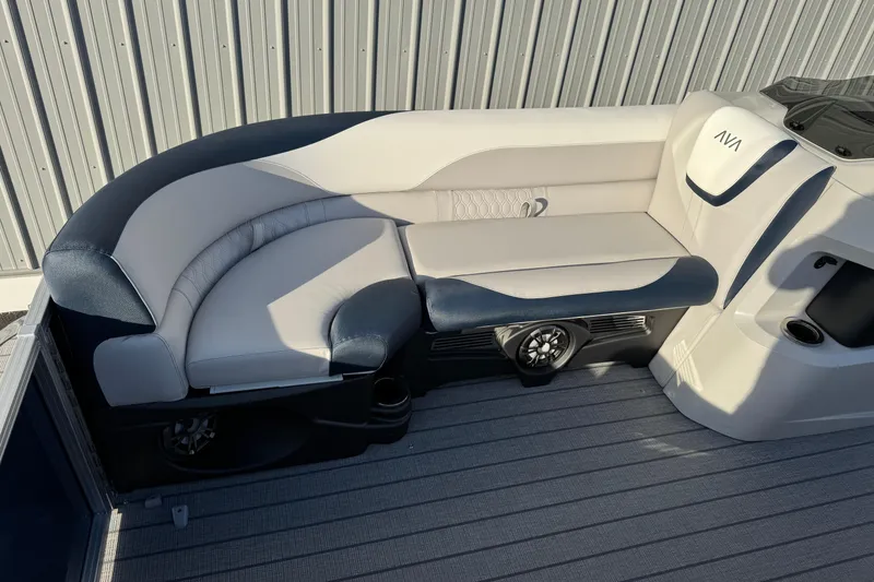 Slide: The Image of Luxurious seating on 2026 Avalon LSZ Entertainer boat with sleek design and integrated speaker. - 8