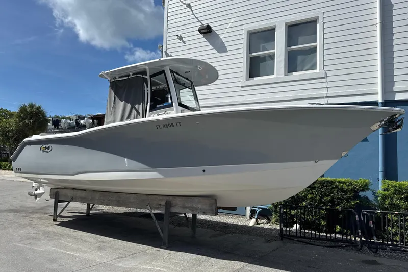 The Image of 2024 Sea Hunt Gamefish 27 Forward Seating boat displayed outdoors. - 0