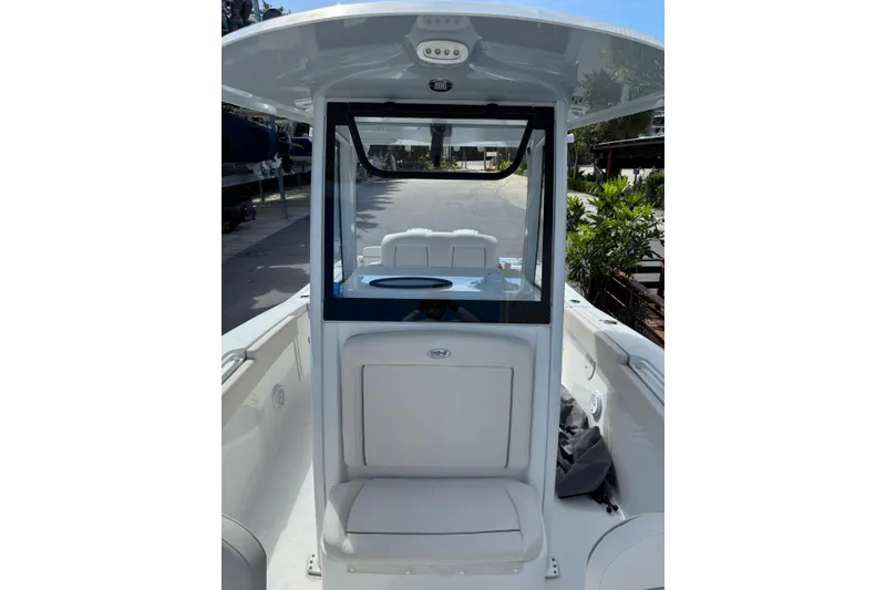 Slide: The Image of 2024 Sea Hunt Gamefish 27 Forward Seating boat interior with seating and console view. - 22
