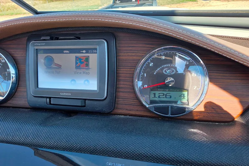 Slide: The Image of Dashboard of a 2013 Cobalt A25 with GPS and RPM gauge. - 22