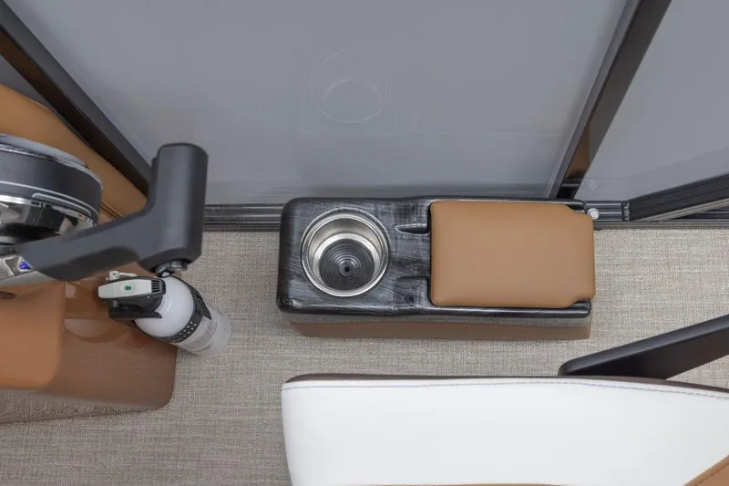 Slide: The Image of 2026 Avalon LSZ CRB interior detail with cup holder and armrest. - 6