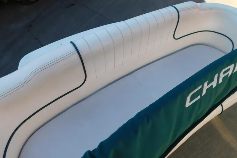 Slide: The Image of White and teal seating on 2001 Chaparral Signature 240 boat. - 11