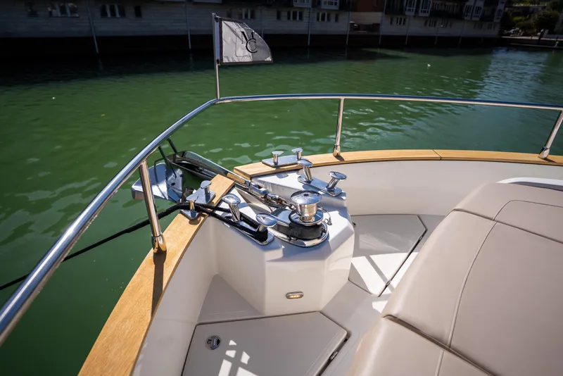 Slide: The Image of Bow area of 2018 Absolute 58 Navetta yacht with anchor and seating. - 20