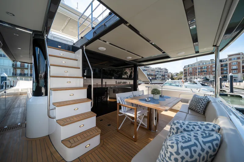 Slide: The Image of Luxurious 2018 Absolute 58 Navetta yacht interior with elegant seating and dining area. - 21