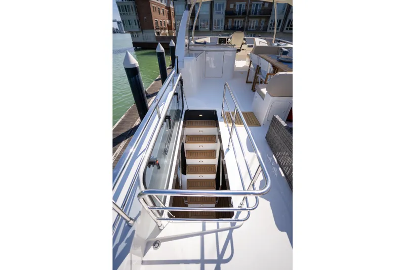 Slide: The Image of Staircase on 2018 Absolute 58 Navetta yacht deck, featuring sleek design and modern amenities. - 22