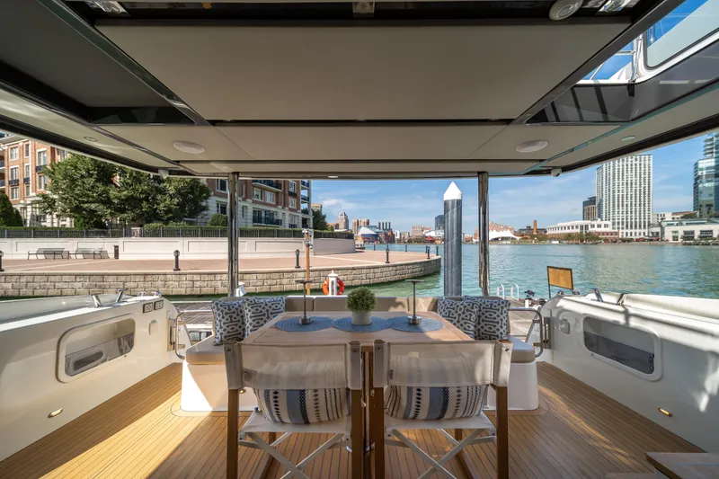 Slide: The Image of Luxurious 2018 Absolute 58 Navetta yacht interior with waterfront city view. - 32