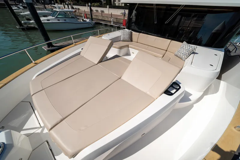 Slide: The Image of Luxurious 2018 Absolute 58 Navetta yacht with spacious sunbathing area and elegant seating. - 40
