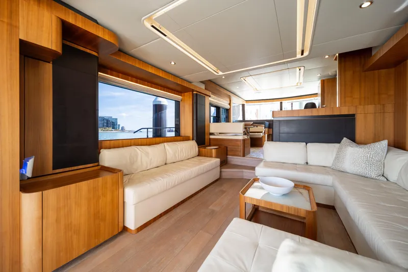 Slide: The Image of Luxurious interior of 2018 Absolute 58 Navetta yacht with elegant wood and white furnishings. - 43