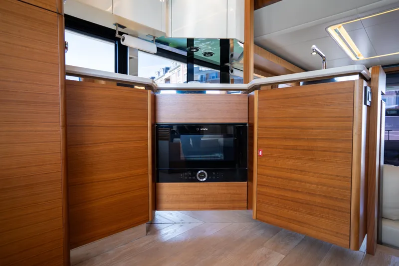 Slide: The Image of Luxurious kitchen interior of 2018 Absolute 58 Navetta yacht with modern appliances. - 51
