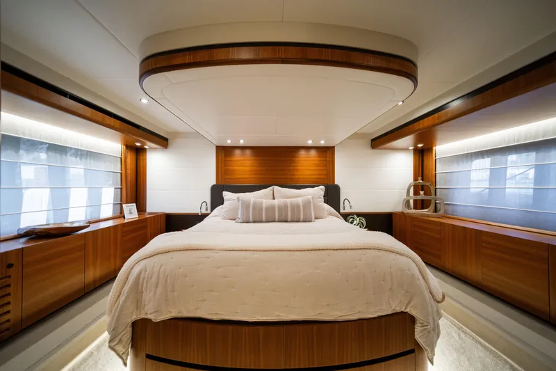 Slide: The Image of Luxurious bedroom interior of 2018 Absolute 58 Navetta yacht with elegant wood finishes. - 58