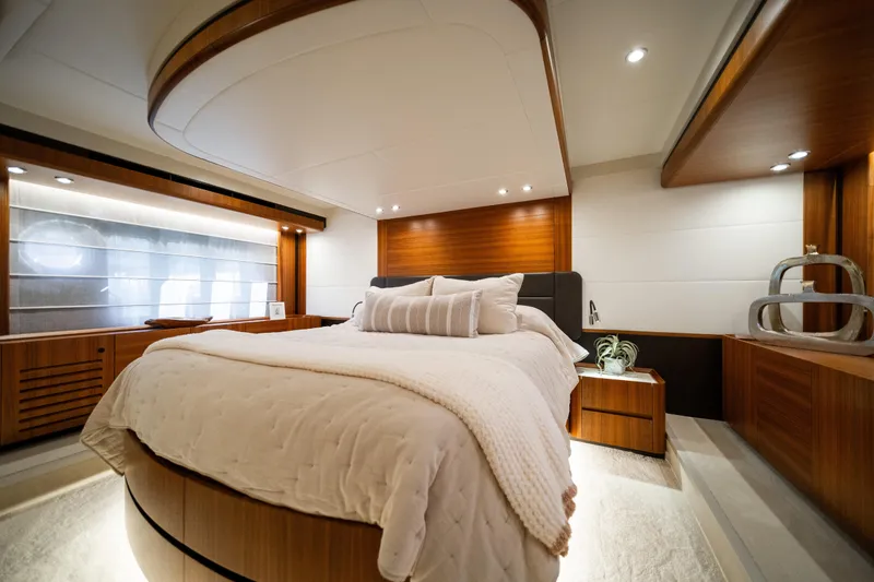 Slide: The Image of Luxurious bedroom interior of 2018 Absolute 58 Navetta yacht with modern wood accents. - 60
