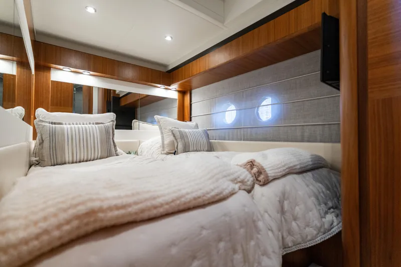 Slide: The Image of Luxurious cabin interior of 2018 Absolute 58 Navetta yacht with cozy bedding. - 65