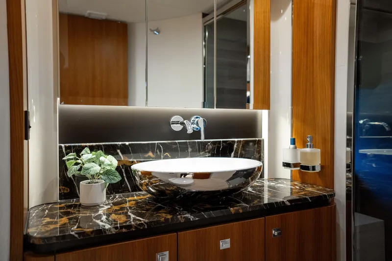 Slide: The Image of Luxurious bathroom in 2018 Absolute 58 Navetta yacht with elegant marble countertop. - 66