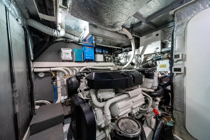 Slide: The Image of Engine room of 2018 Absolute 58 Navetta yacht, showcasing machinery and equipment. - 74