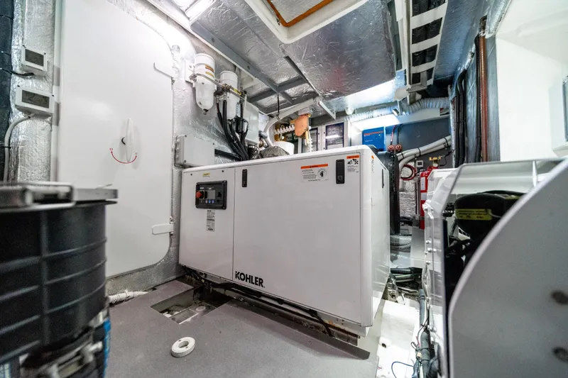 Slide: The Image of Engine room of 2018 Absolute 58 Navetta yacht with Kohler generator. - 76