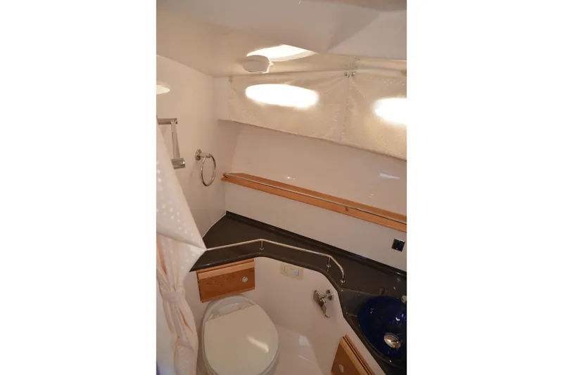 Slide: The Image of 2020 Cutwater C-30S boat bathroom with modern fixtures and compact design. - 28