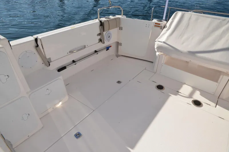 Slide: The Image of 2020 Cutwater C-30S boat deck with seating, storage, and water view. - 31