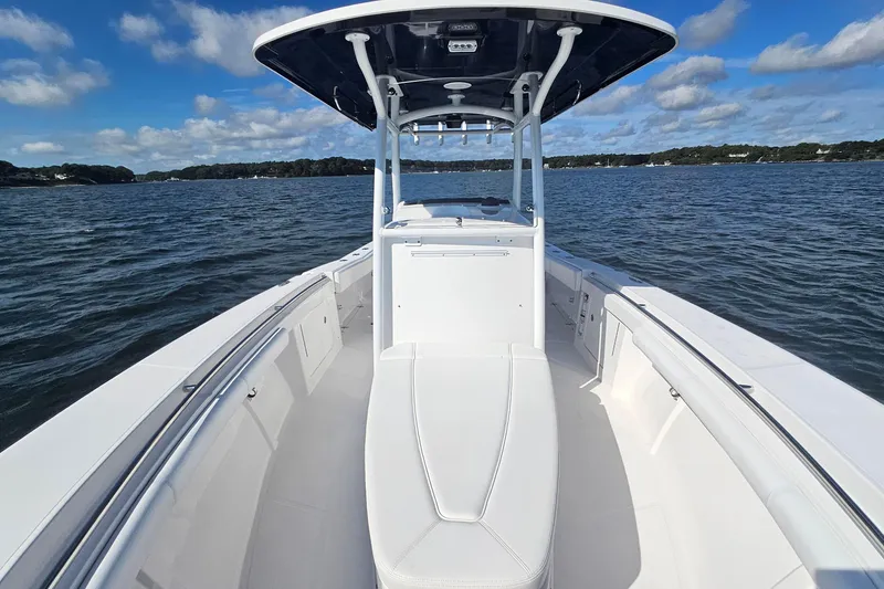 Slide: The Image of 2019 Southport 272 TE boat on open water under blue sky. - 39