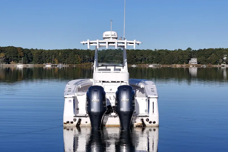 Slide: The Image of 2019 Southport 272 TE boat with dual engines on calm water. - 5