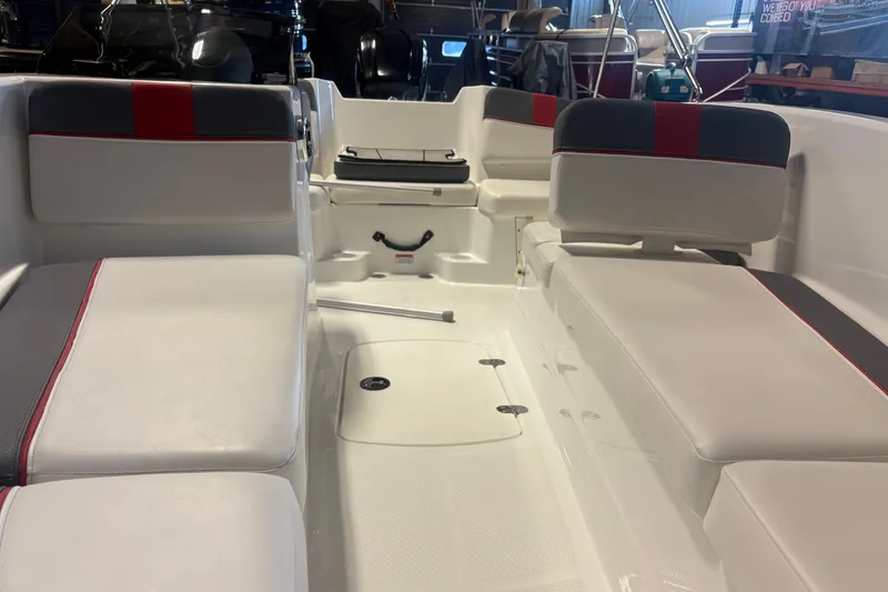 Slide: The Image of Interior of 2020 Tahoe T16 boat with white and red seating. - 14
