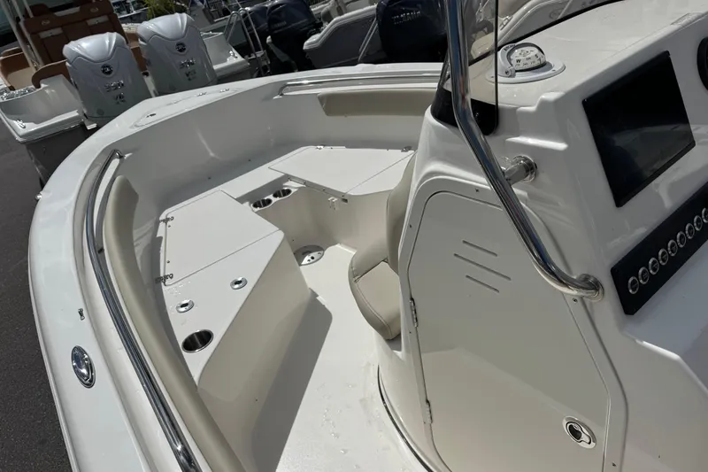 Slide: The Image of 2026 Key West 203 FS boat interior with console and seating area. - 15