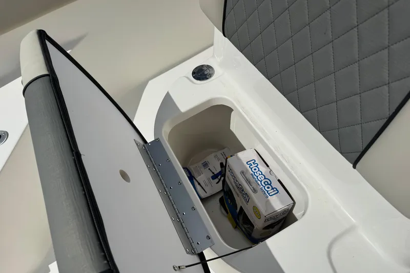 Slide: The Image of Storage compartment in 2026 Key West 203 FS boat with HoseCoil box inside. - 20