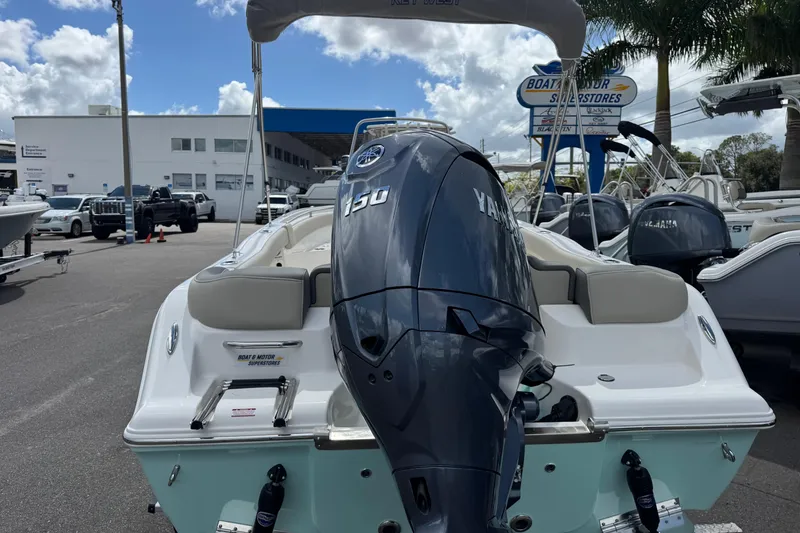 Slide: The Image of 2026 Key West 203 FS boat with Yamaha 150 engine at dealership. - 4