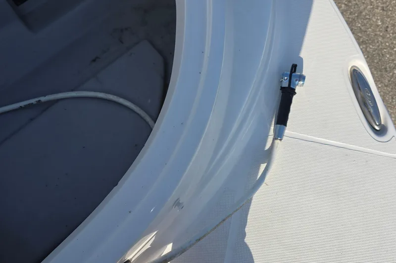 Slide: The Image of 2013 Rinker 276 Captina boat deck with cable and fitting detail. - 39