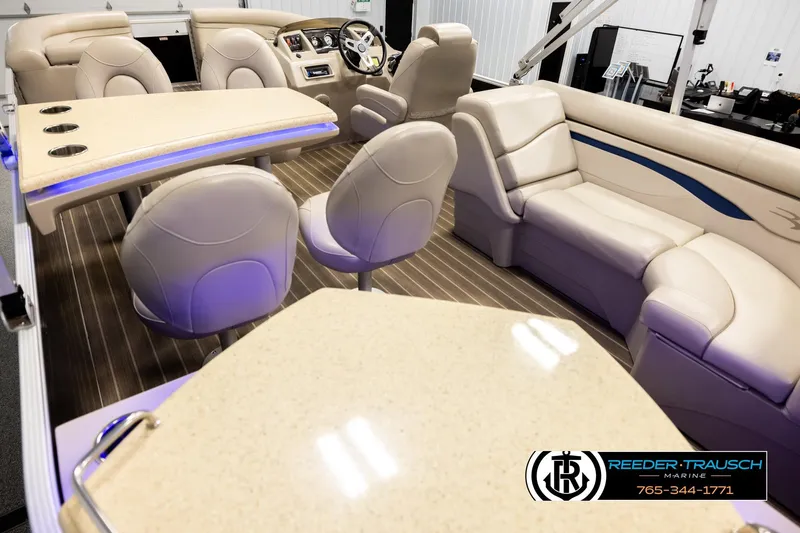 Slide: The Image of Luxurious interior of a 2016 Bennington 24 SPDXDF pontoon boat with plush seating and modern design. - 11