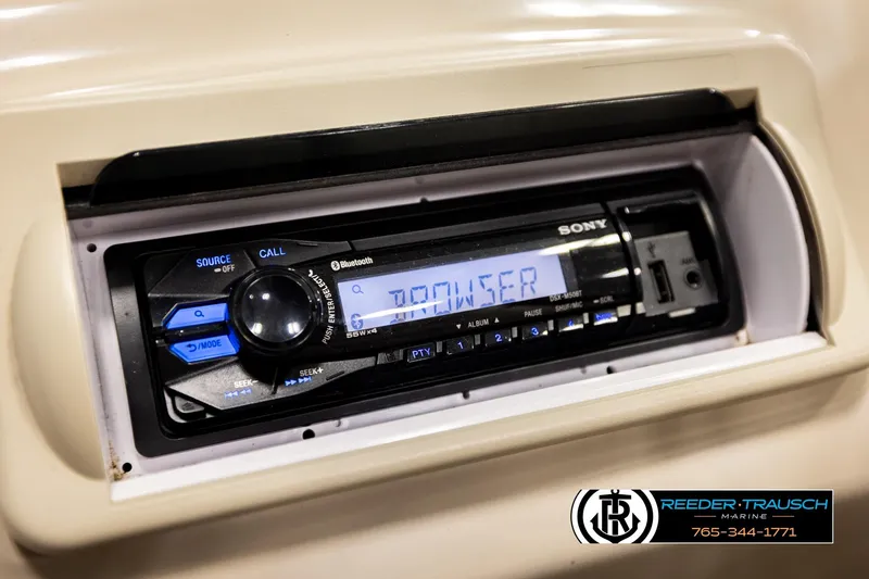Slide: The Image of Sony stereo system in a 2016 Bennington 24 SPDXDF boat dashboard. - 32